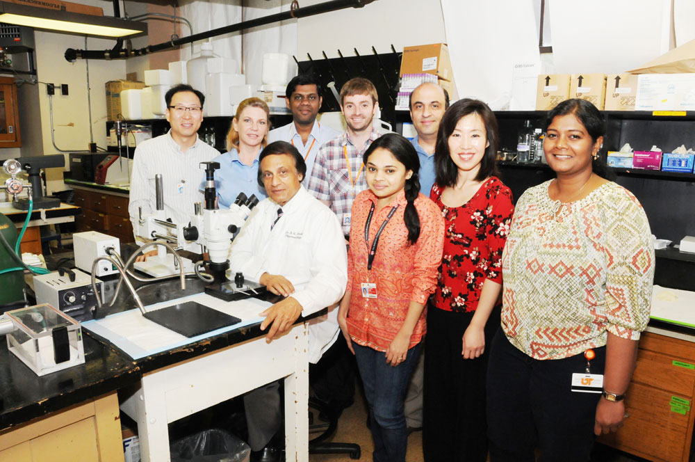 Dr. Kafait Malik and his team in lab