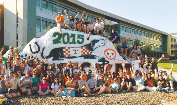 CVM class of 2015 in front of The Rock, painted with Smokey, a horsehow and the state Tri-Star symbol