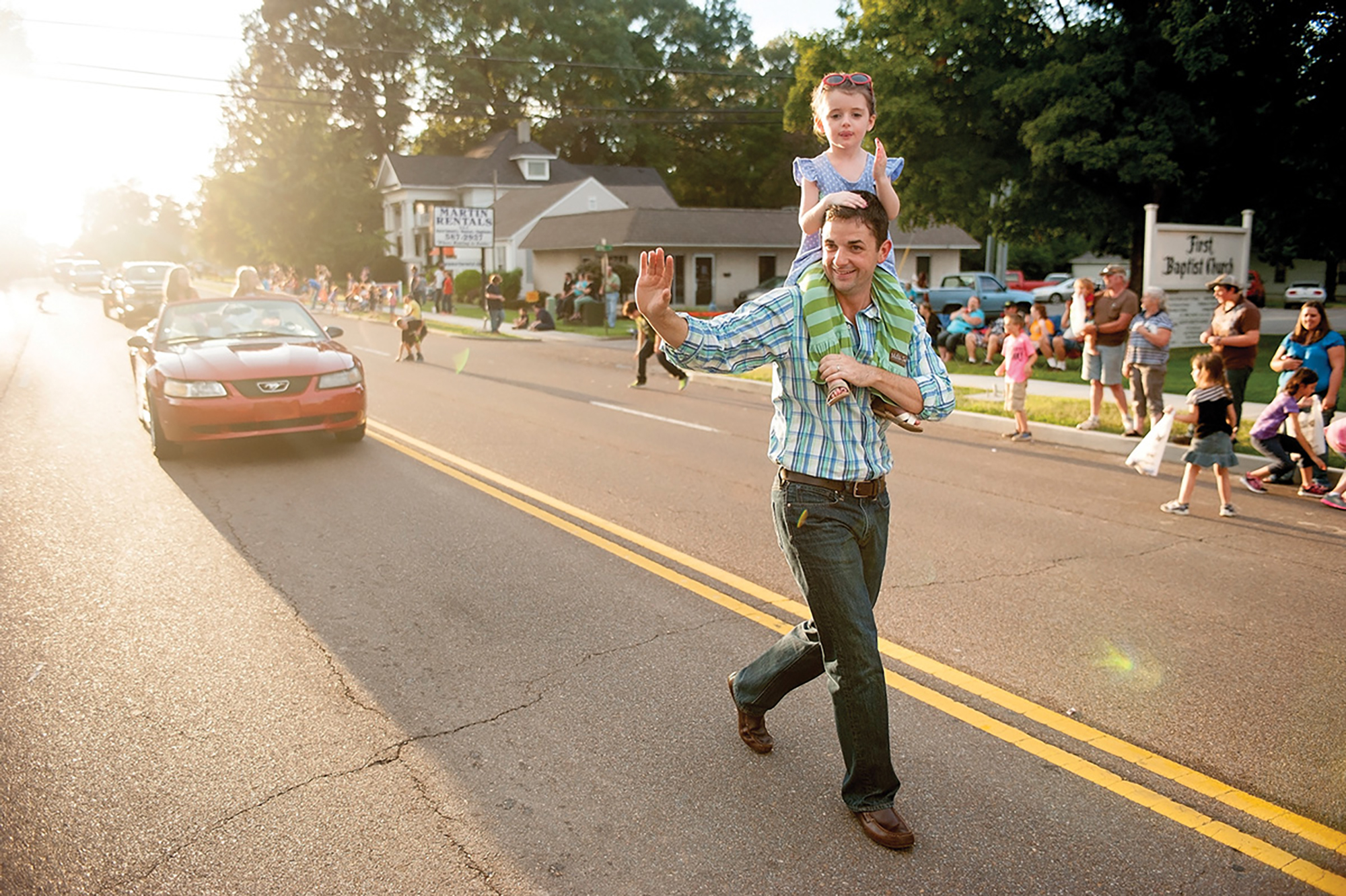 Jake Bynum and daughter Ella in the Tennsee Soybean Festival parade in 2014
