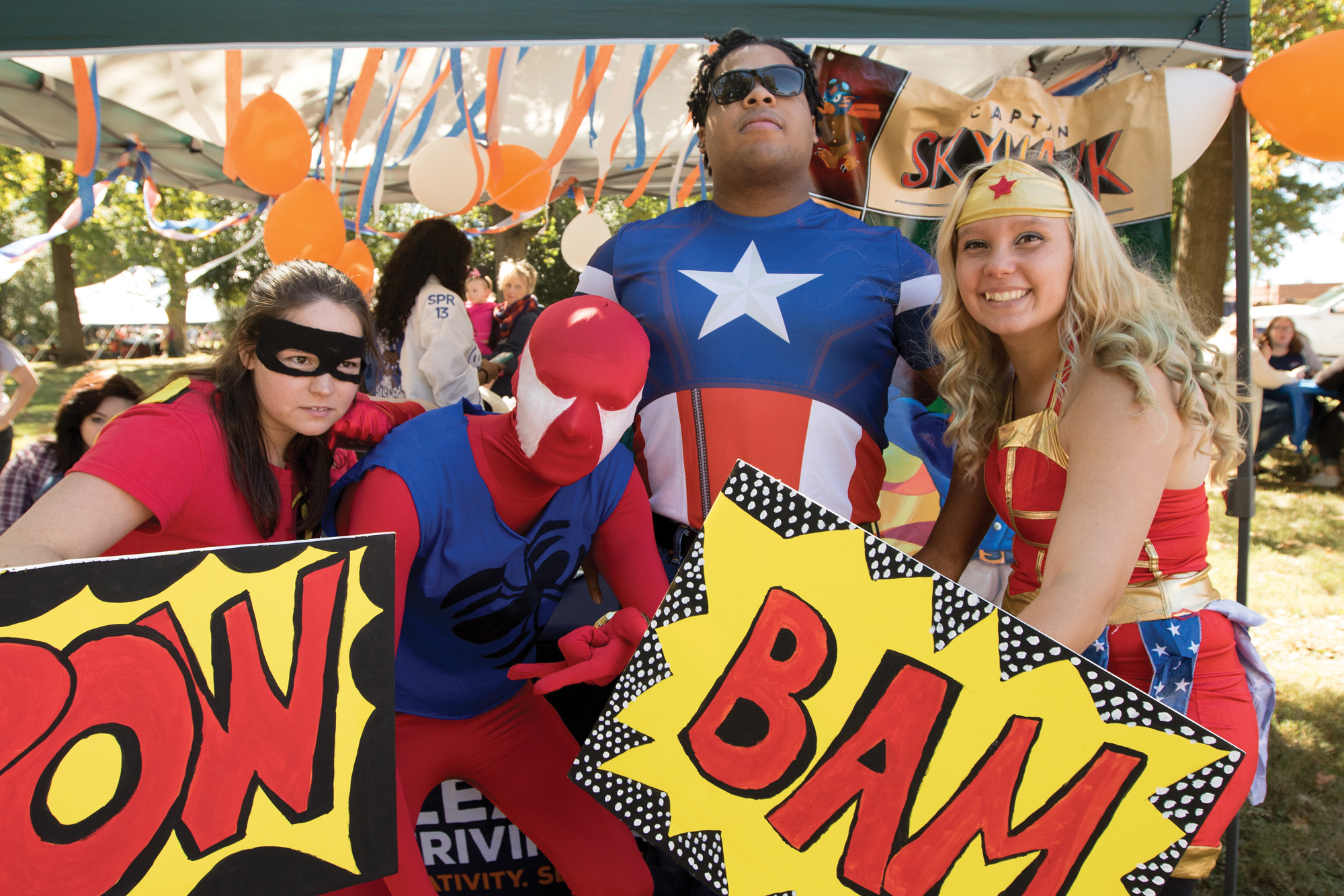 Students dressed as Robin, Spiderman, Captain America and Wonder Woman