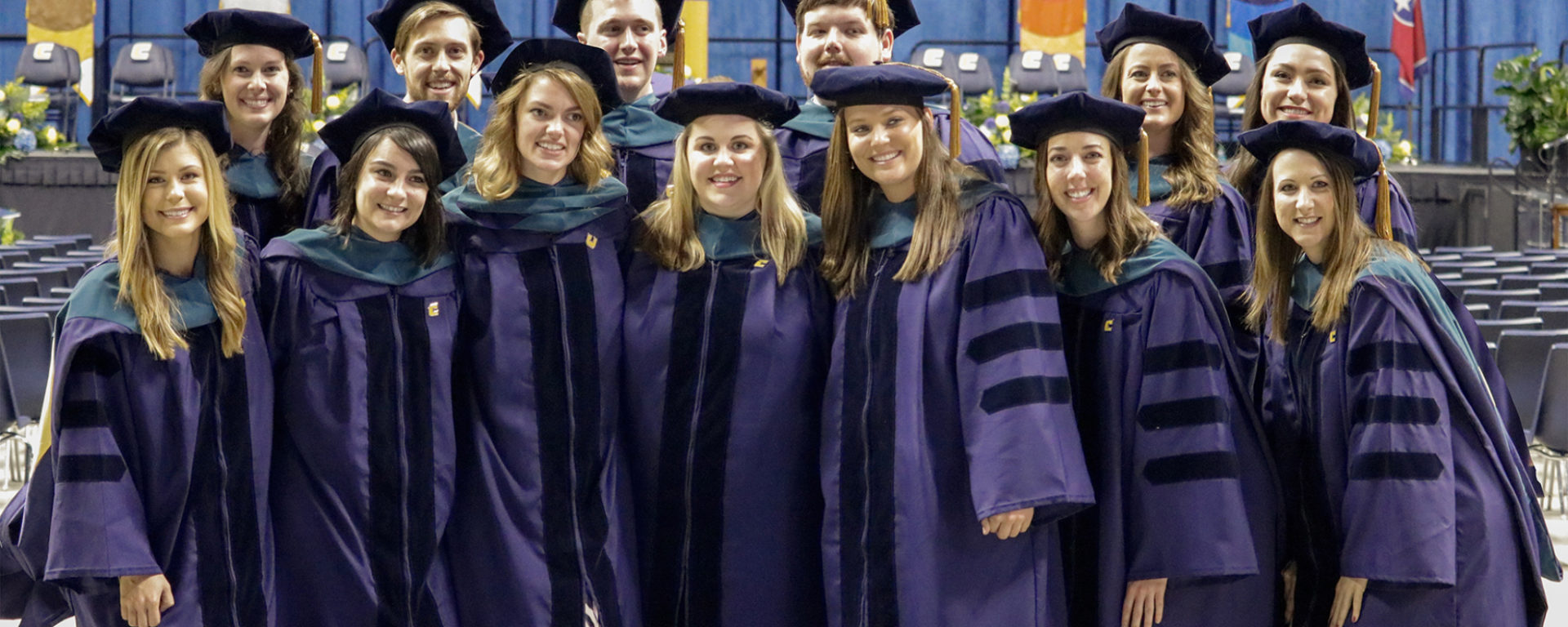 Participants in the first occupational therapy doctoral program gather after graduation.
