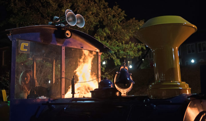 The Mocs Express Train reflects the glow of the bonfire during Homecoming After Dark on Chamberlain Field at the University of Tennessee at Chattanooga.