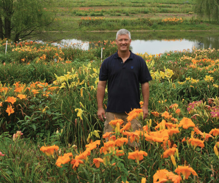 Ken Oakes in a field of daylilies