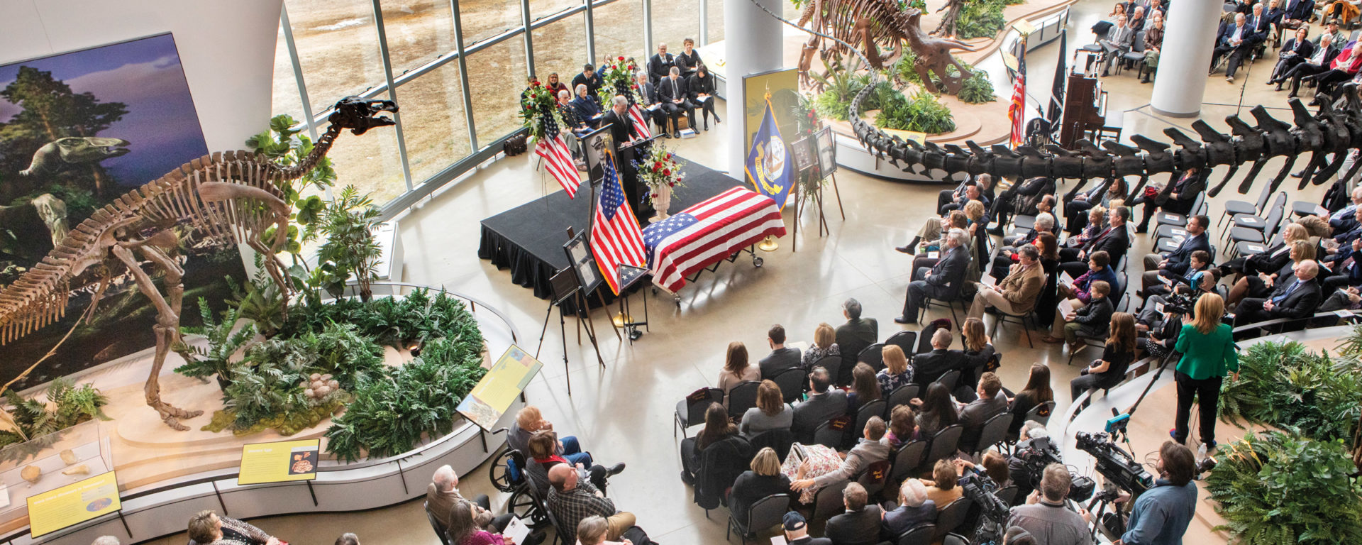 Mourners attending Lt. Richard “Tito” Lannom’s memorial service at Discovery Park of America filled all three floors of the museum.