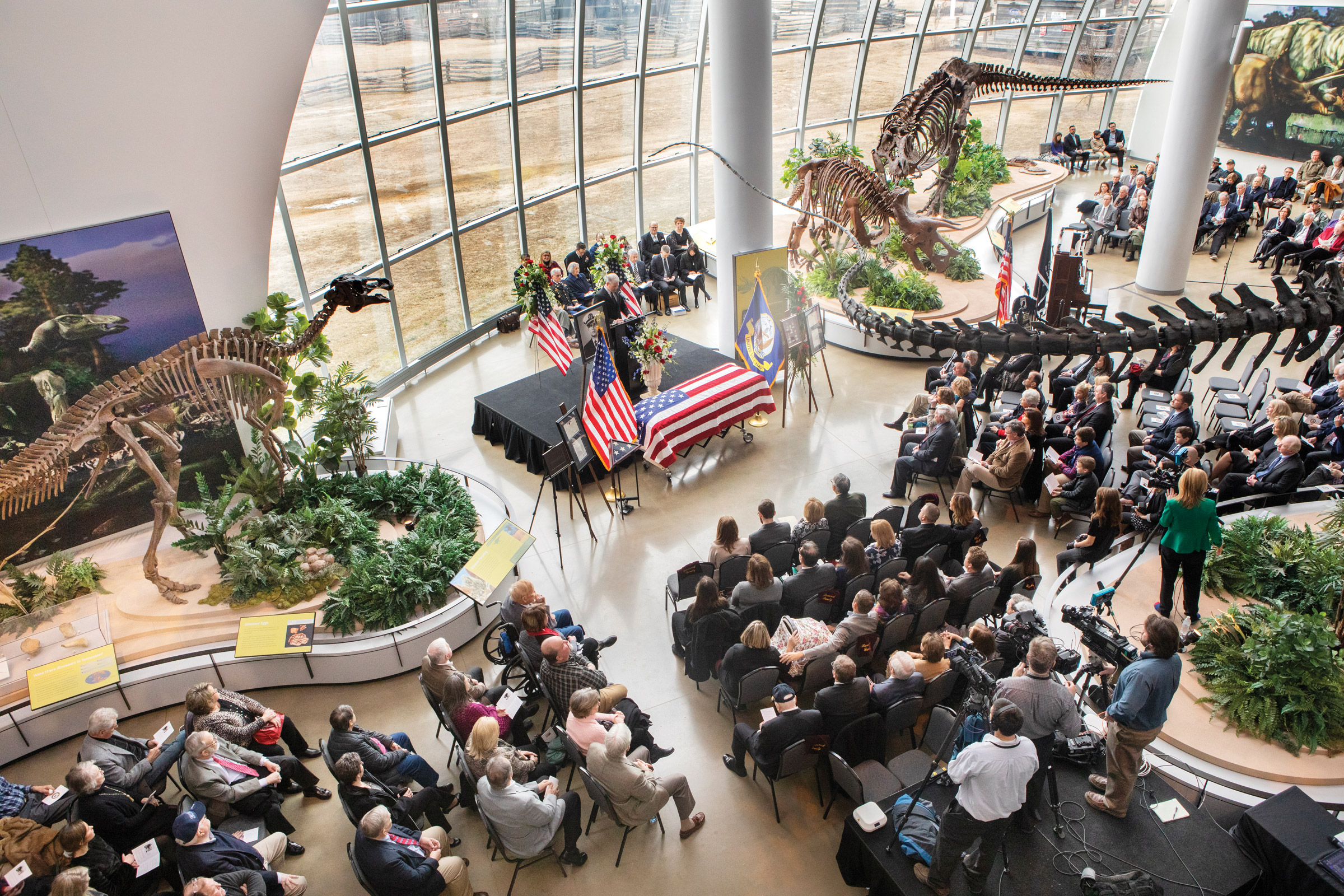 Mourners attending Lt. Richard “Tito” Lannom’s memorial service at Discovery Park of America filled all three floors of the museum.