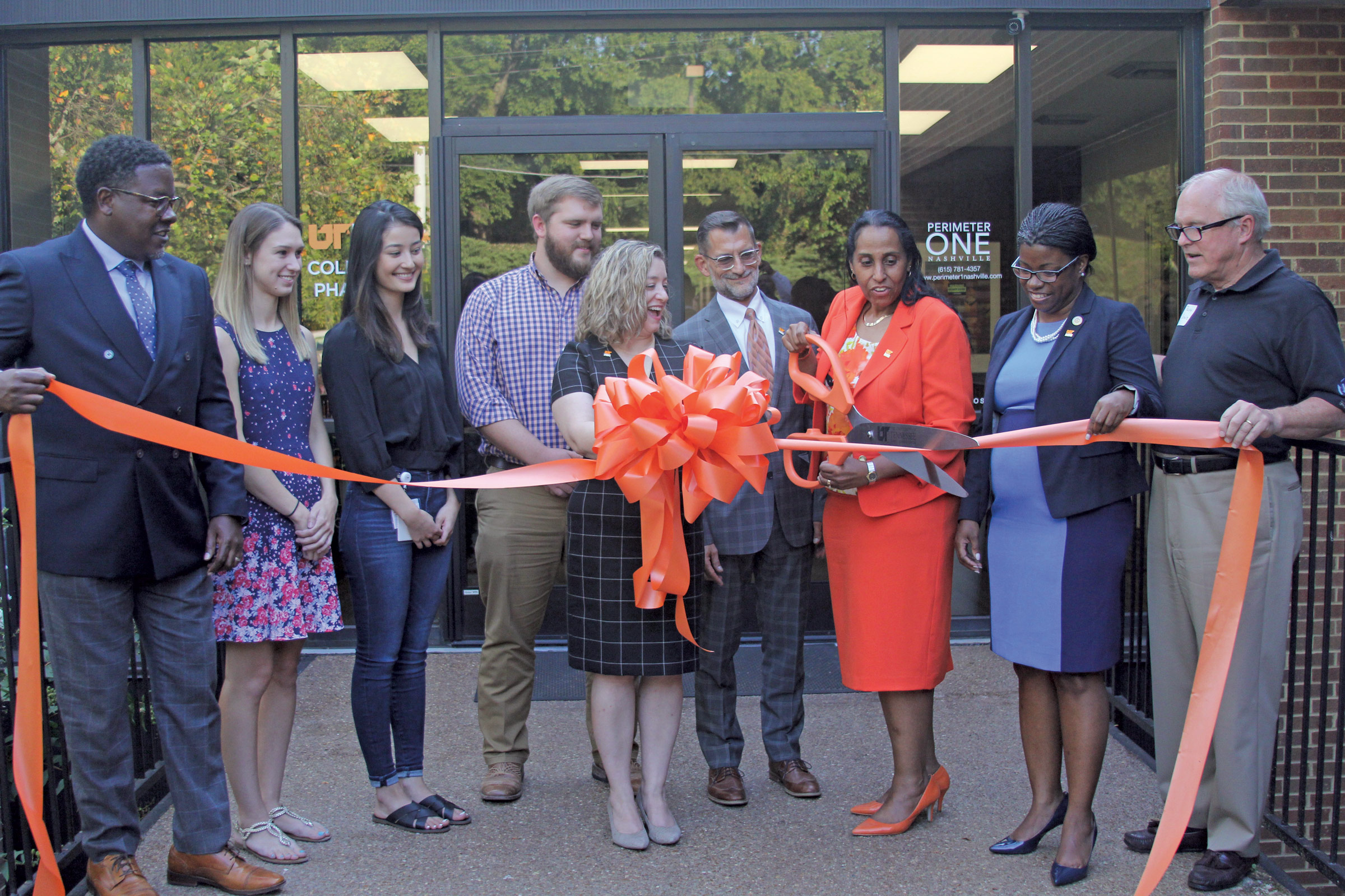 College of Pharmacy leaders and students celebrate the opening of a larger space to learn.