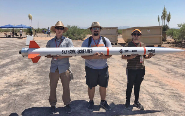 UT Martin's rocket team pictured with an 8 foot rocket called "Skyhawk Screamer"