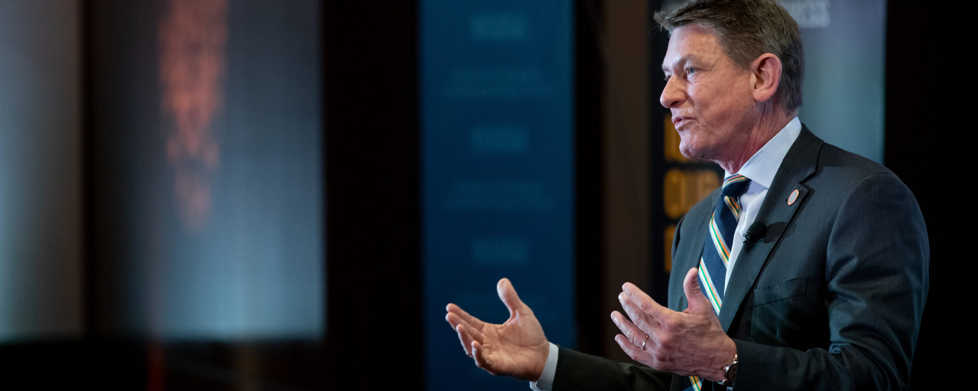 Randy Boyd delivers the State of UT address on stage