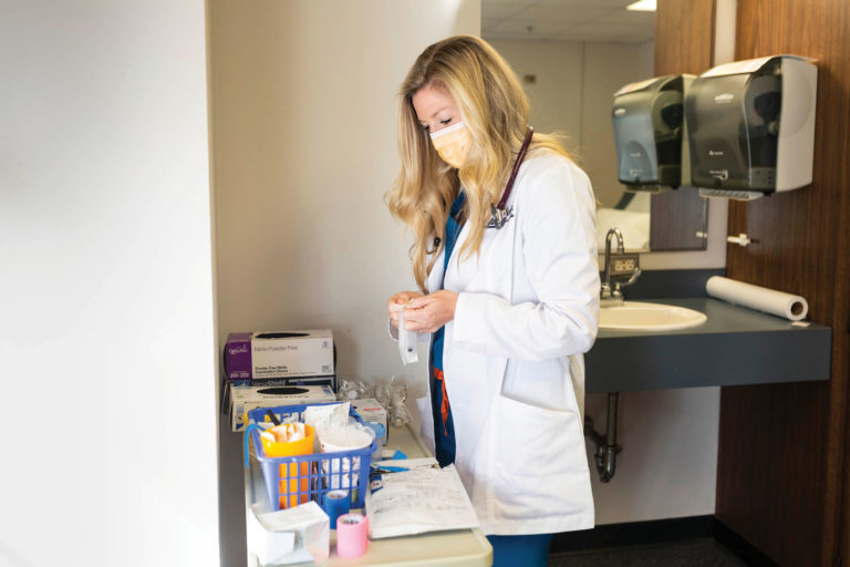 Jennifer Winbigler prepares a vaccine