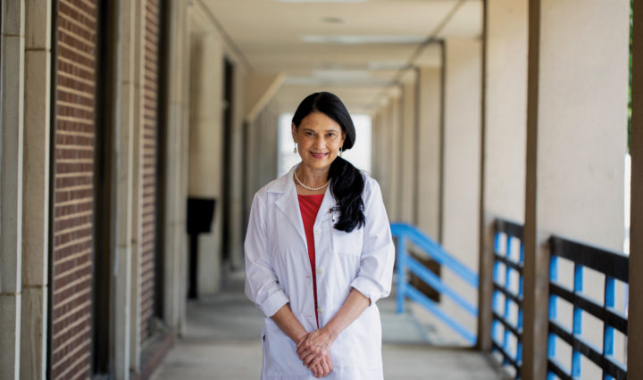 Dr. Mukta Panda stands in a hospital hallway