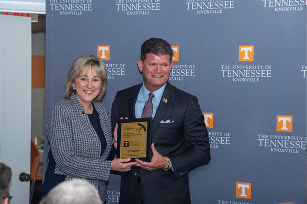 UT Chancellor Donde Plowman with Greg Brown.