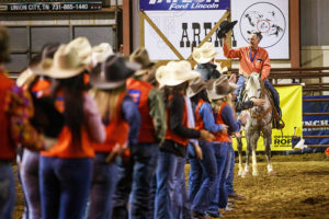 John Luthi acknowledges the Skyhawk rodeo team and fans.