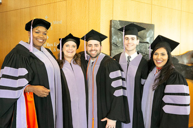 UTHSC Dentistry Students posed in their cap and gowns.
