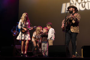 Ellie and Drew Holcomb's children—Emmylou, Rivers and Huck—join them to perform during the You and Me concert in Birmingham, Alabama. 
