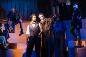 Cornelius Smith Jr. (Frederick Douglass), left, Chris Roberts (John Brown), and the cast of American Prophet at Arena Stage at the Mead Center for American Theater. Photo By Margot Schulman
