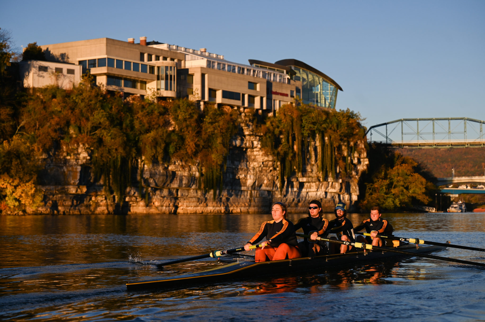UTC rowers skim across the Tennessee River. From left, Karoline Bonastia, Nathaniel Haley, Steven Sanford and Ethan Hitchcock. Photo By Angela Foster University of Tennessee at Chattanooga