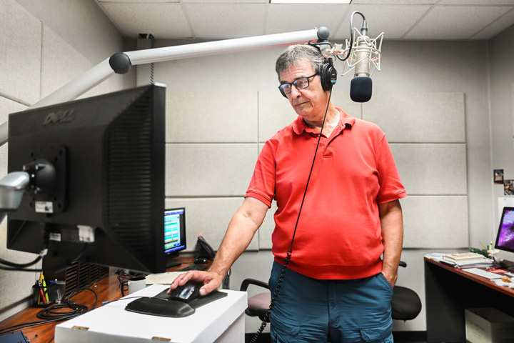 Richard Winham broadcasts from WUTC-FM’s new station space. 