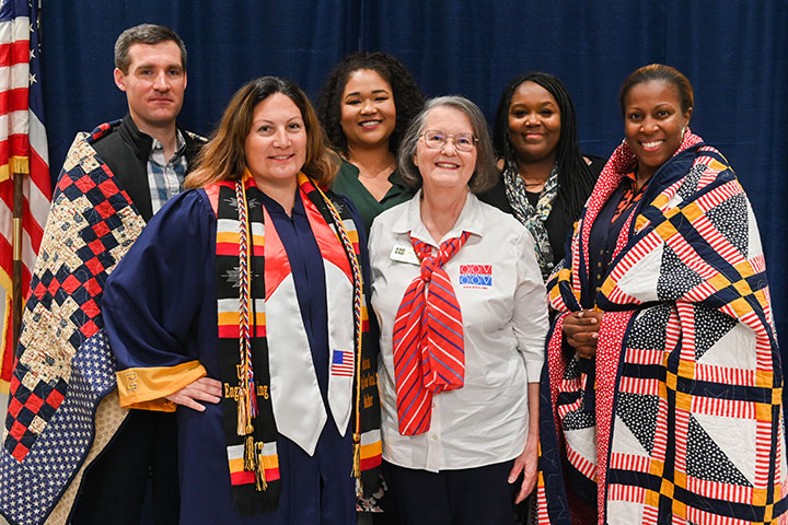 Chattanooga graduates who are veterans received quilts from Quilts of Valor.