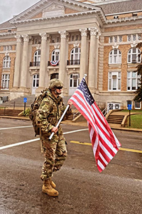 UT Southern student Brandon Devore marches in downtown Pulaski.