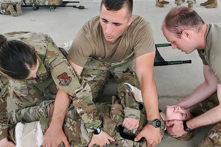Hayden Hall and three other cadets participate in a military medical training exercise.