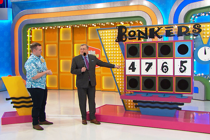 Aaron Bolen participates in the 'Price is Right' gameshow with host Drew Carey.