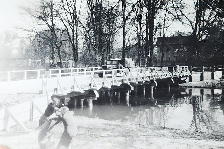 Black and white photo of a bridge built by T Joe Walker's combat battalion in two days in Bad Kissingen, Germany, during World War II.