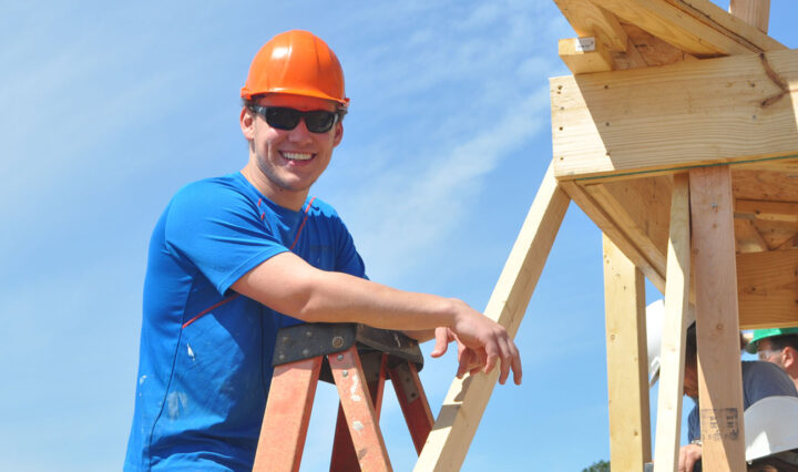 Sam Banks, Knoxville '23, assists in constructing a Habitat for Humanity house.
