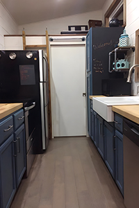 The galley kitchen provided full-size appliances for the couple.