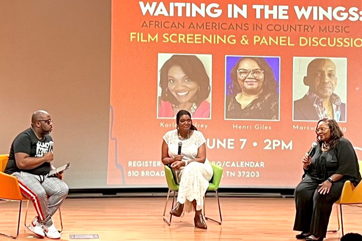 Henri Giles, right, discusses her documentary about African Americans in country music during a presentation at the National Museum of African American Music in Nashville.