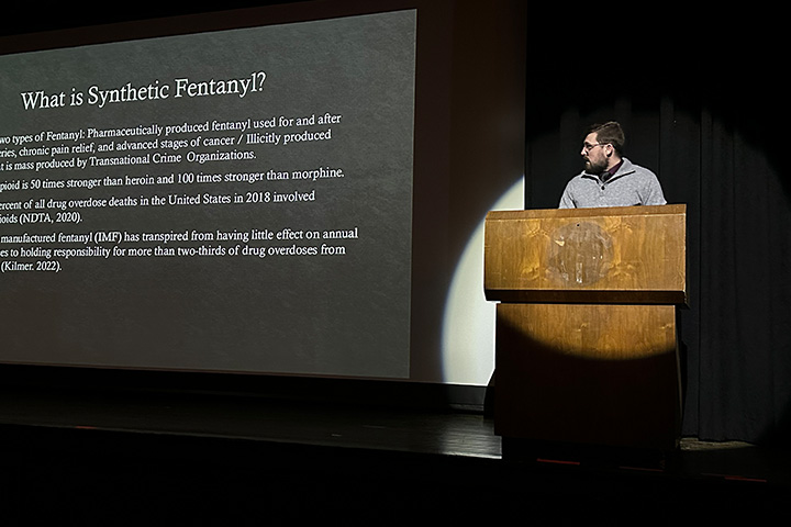 A criminal justice major presents his research to the campus and community.