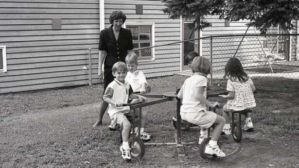 Margaret Perry, sixth chancellor of UT Martin, watches children play outside the children's center that would be named for her.