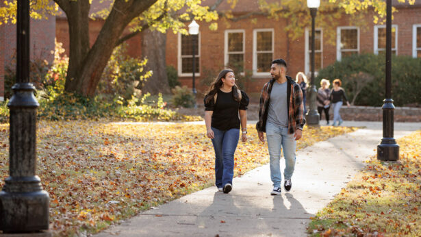 Two students walking across campus at UT Martin.
