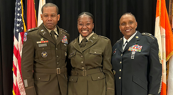 Posing at 2nd Lt. Christina Mills’ commissioning ceremony with Mills, center, are Lt. Col. Bernard House, UTM professor of military science, and Mills’ aunt, retired Sgt. Maj. Jenette Smith.