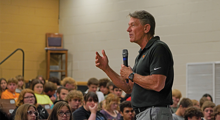 UT System President Randy Boyd speaks to high school students on the 2023 UT Promise Tour.
