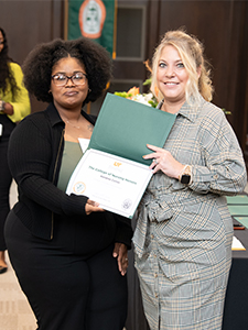 Kendree Collier, left, receives the Chancellor's Diversity Scholarship from UTHSC Nursing Dean Wendy Likes.