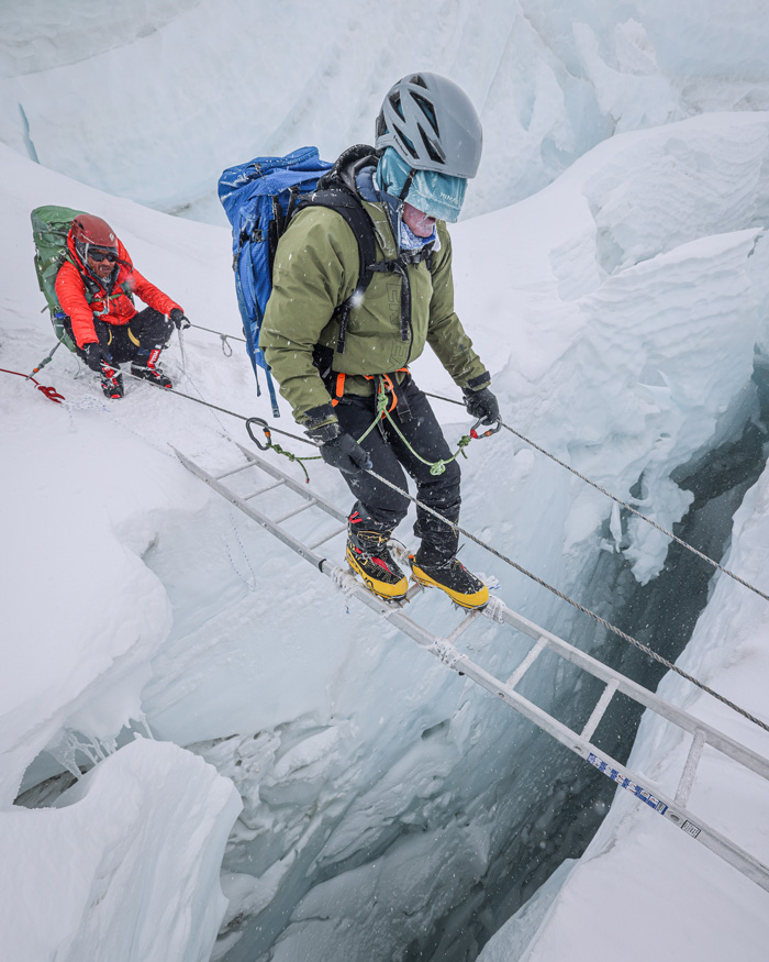 Finjo Sherpa and Lonnie Bedwell cross the Khumbu Icefall.