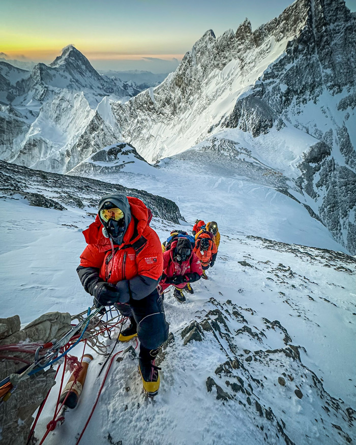 Michael Neal, Dawa Sherpa and Finjo Sherpa ascend fixed lines on the triangular face on the morning of the summit.