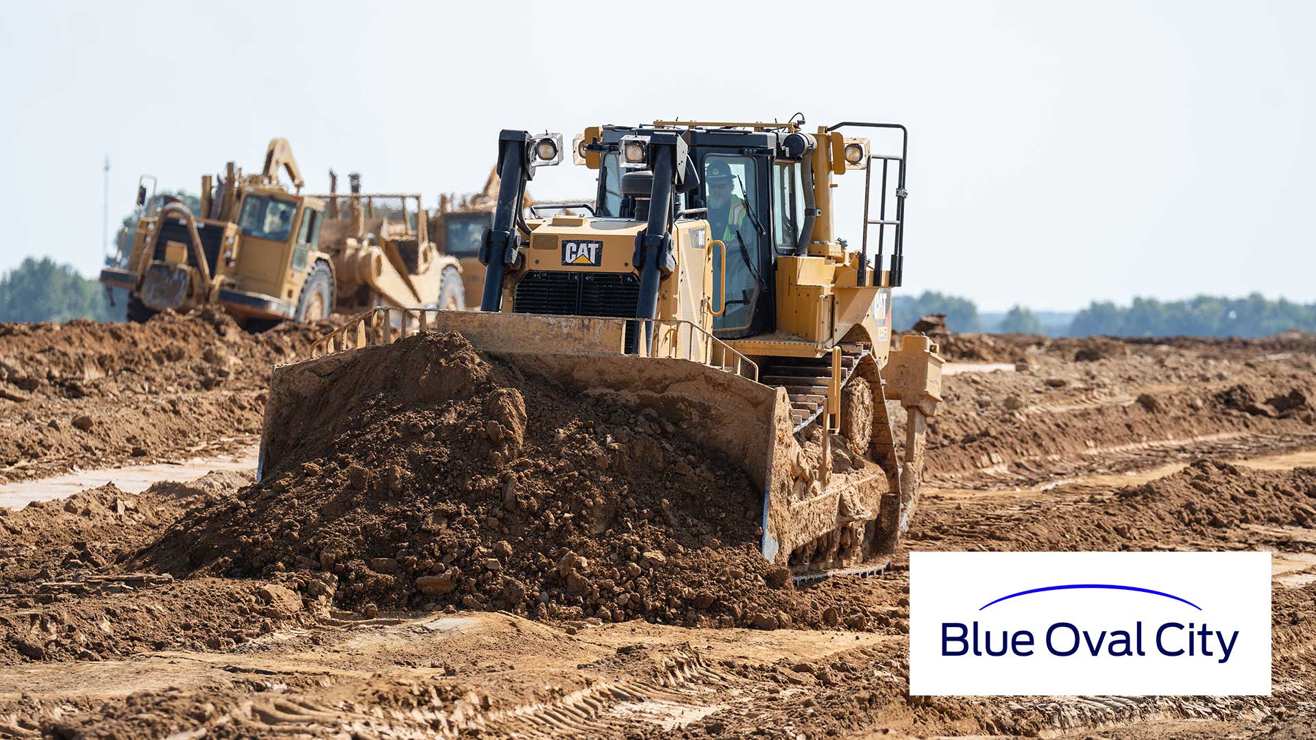 A bulldozer moving dirt at the construction site of BlueOval City in West Tennessee.