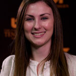 Liz Crye headshot in front of a UT Southern backdrop.