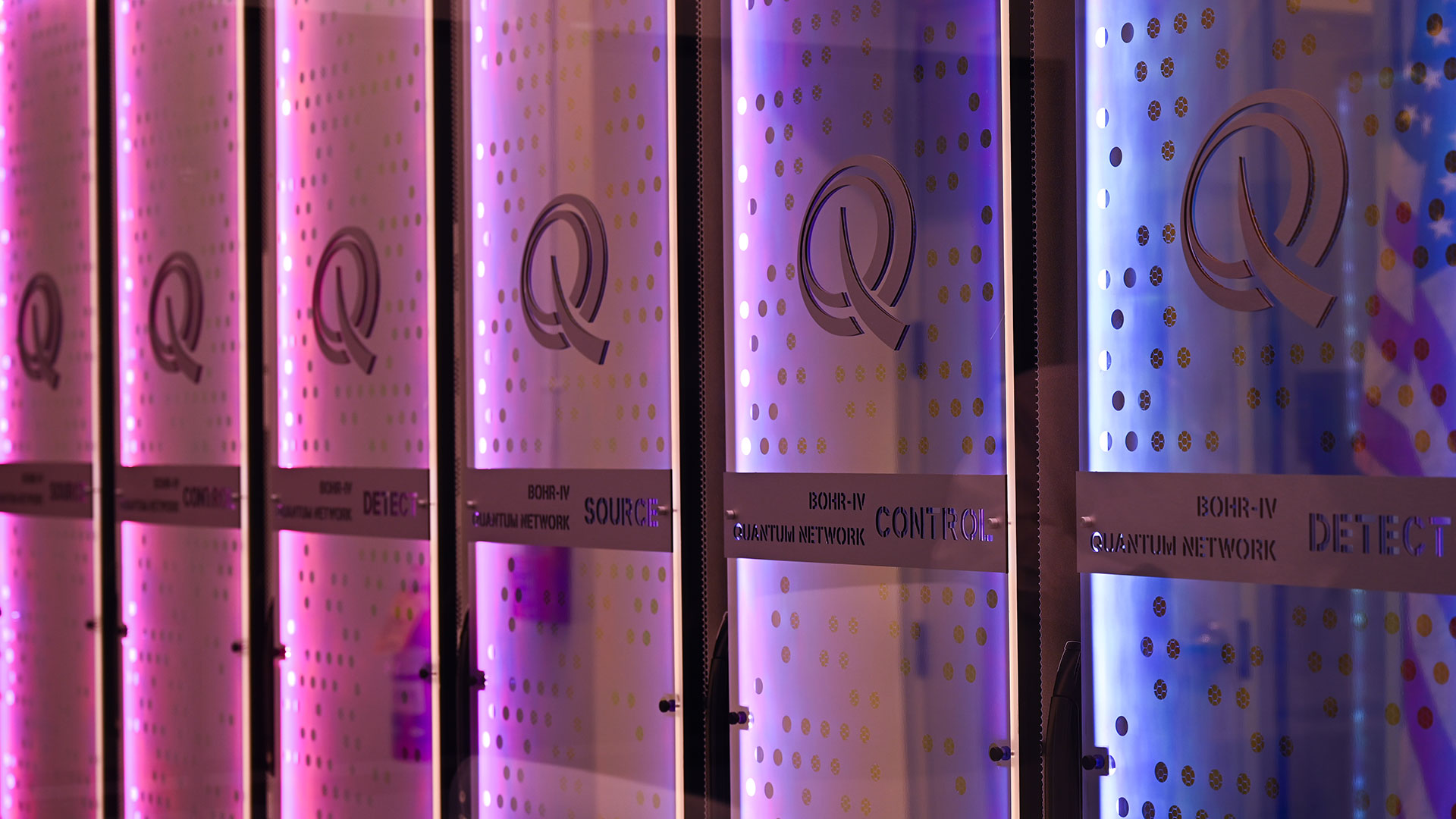 Server stacks lit by red and blue LED lights.