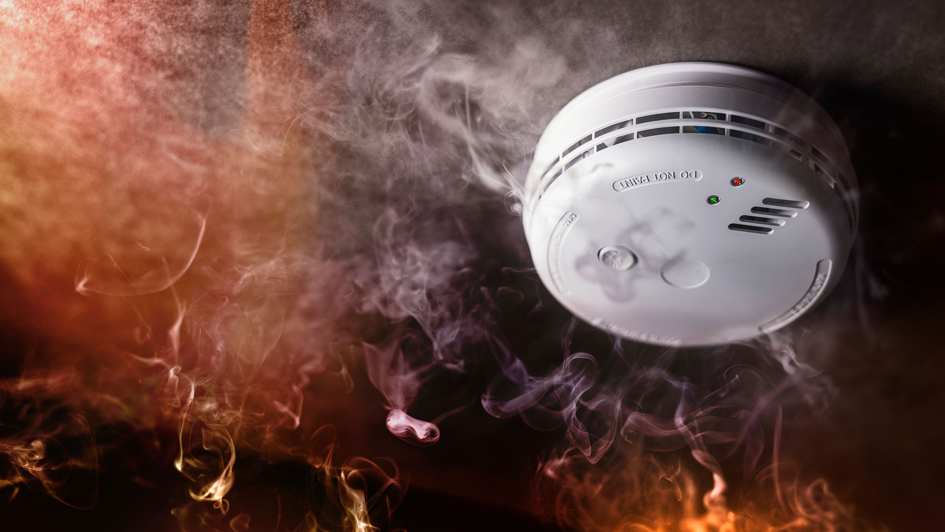 Abstract image of a smoke detector with smoke surrounding it.