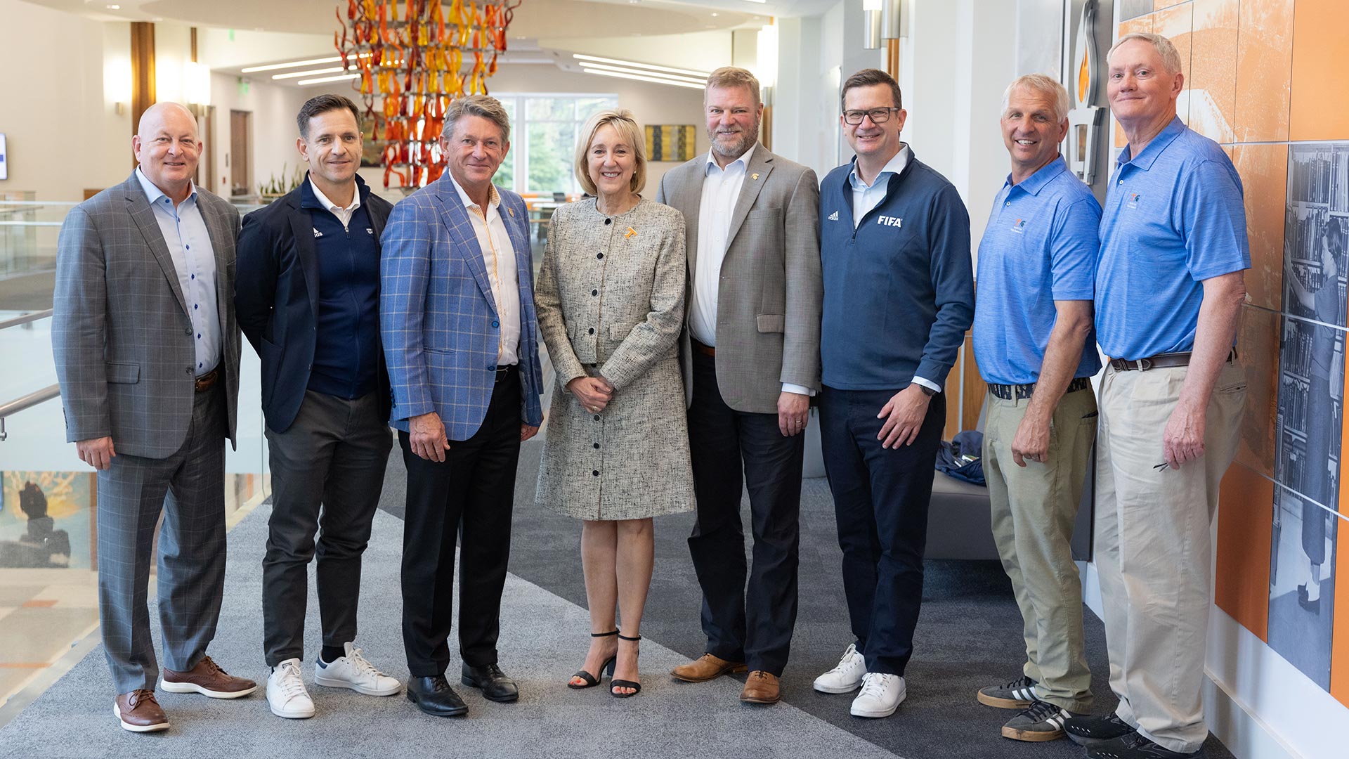 Leaders from the University of Tennessee and FIFA pose for a group photo.