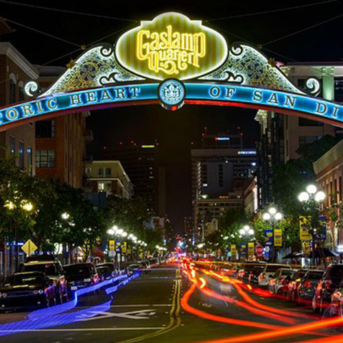Night street phototgraphy in San Diego, with trailing car tail-lights streaking down the street.