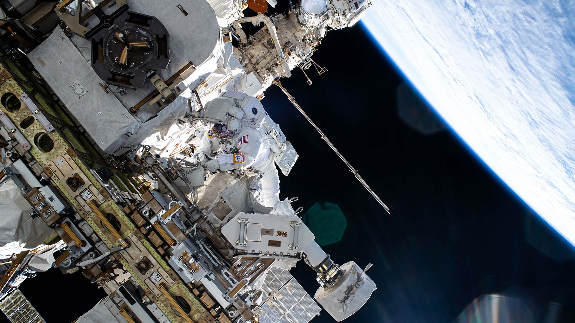 An astronaut spacewalking while working on the International Space Station.