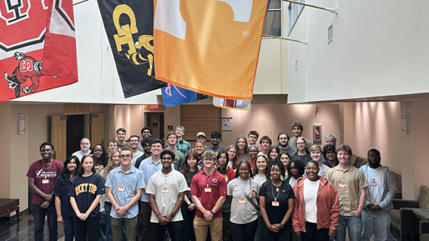 A group of students standing together for a photo.