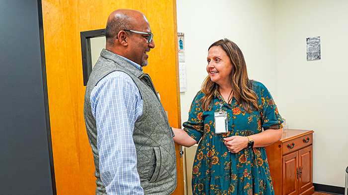 A man and women talking.