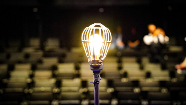 A yellow lightbulb up close.