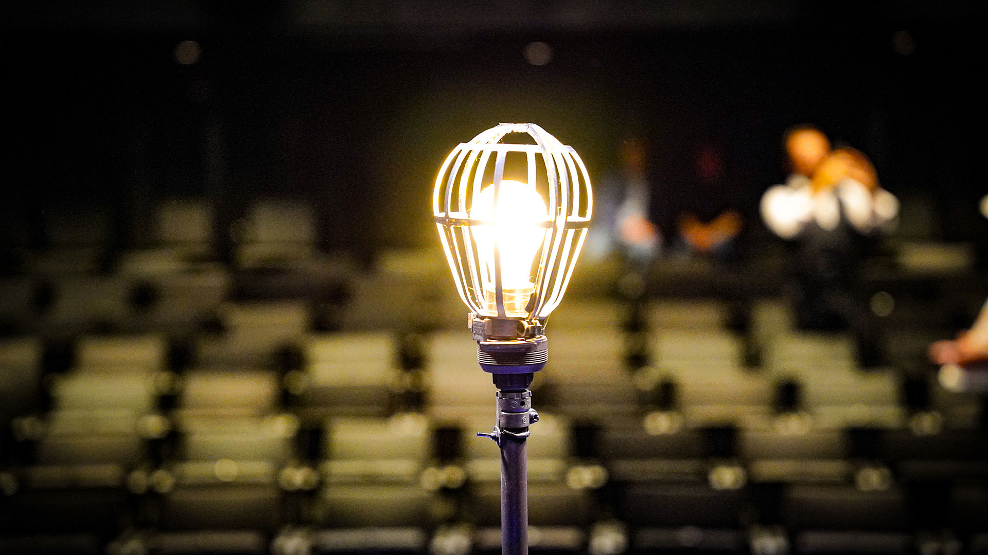 A yellow lightbulb up close.