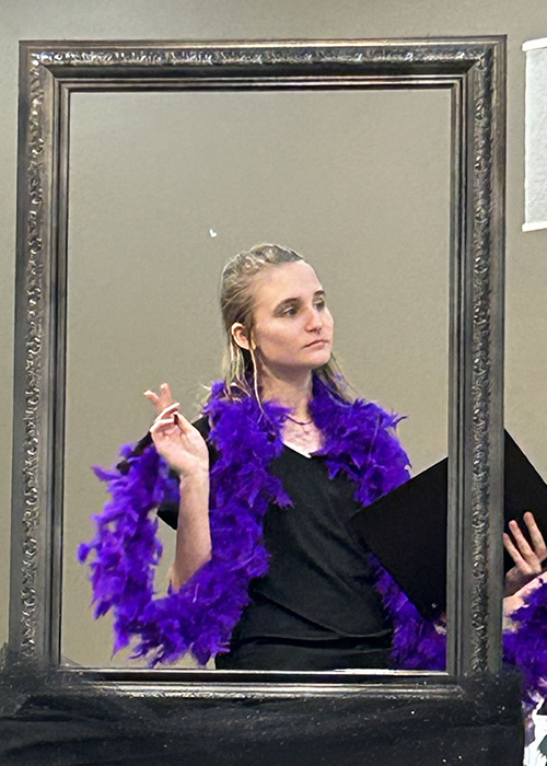 A girl acting in a play.