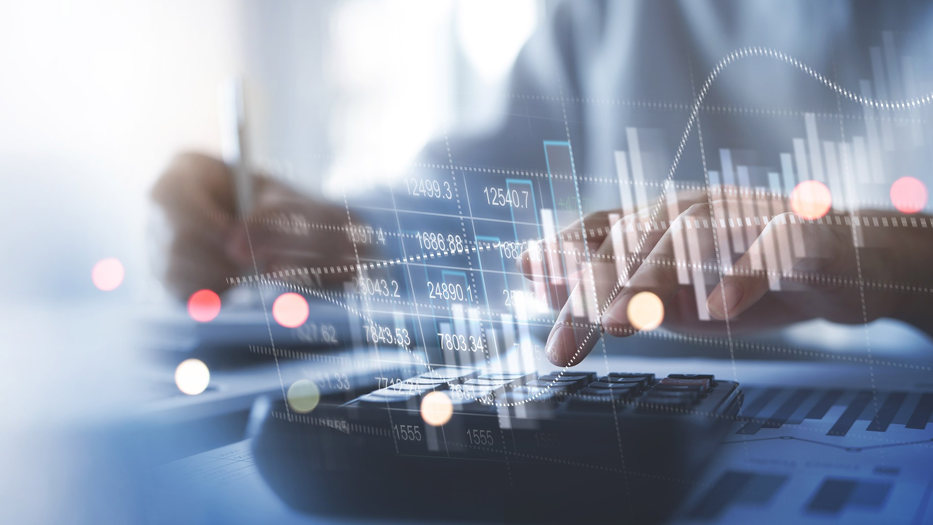 Abstract photo of person using a keyboard, with accounting charts and graphs layered on top.